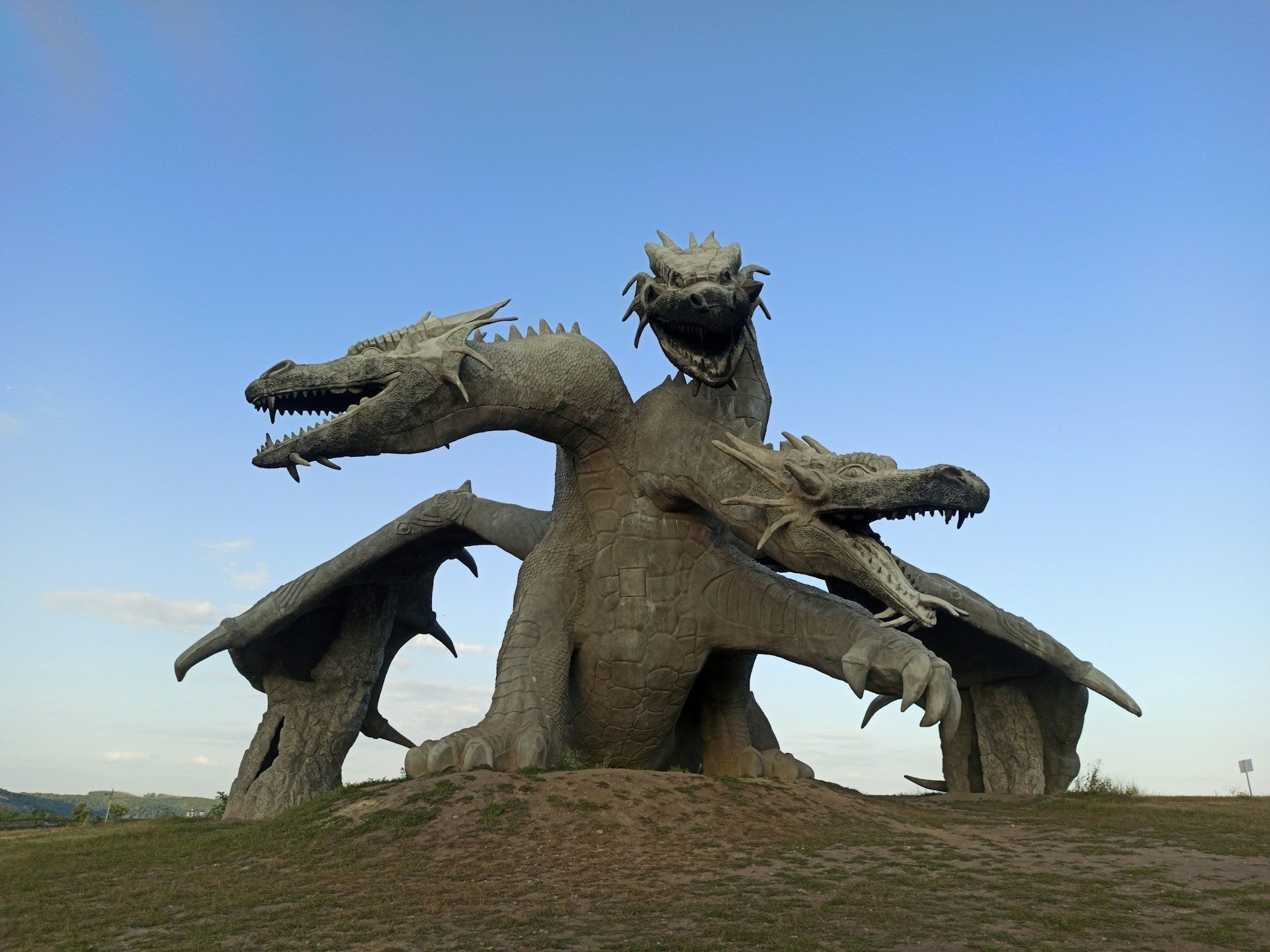 a statue of a three headed dragon