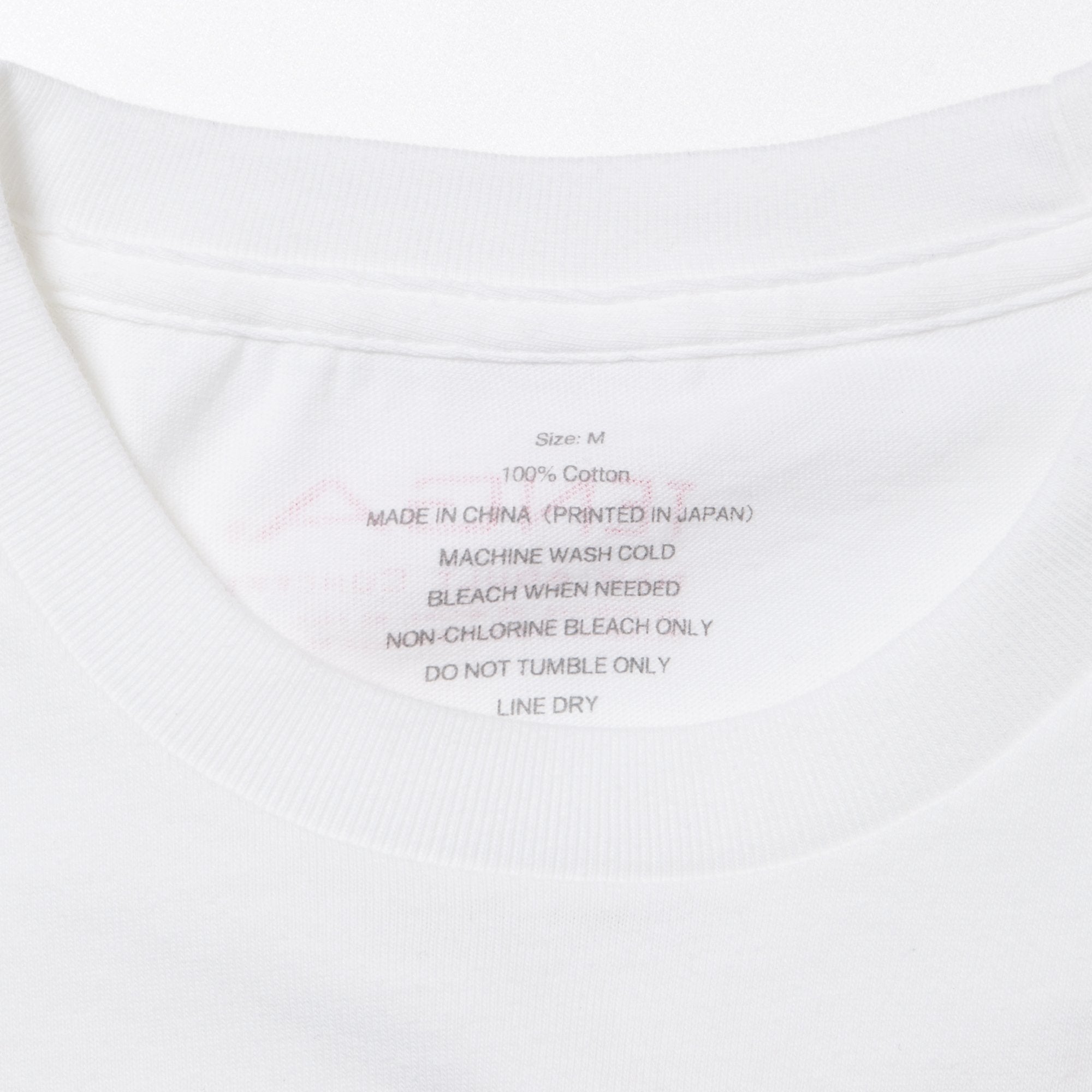 Playing with TENGA T-SHIRT Blanc x Jaune